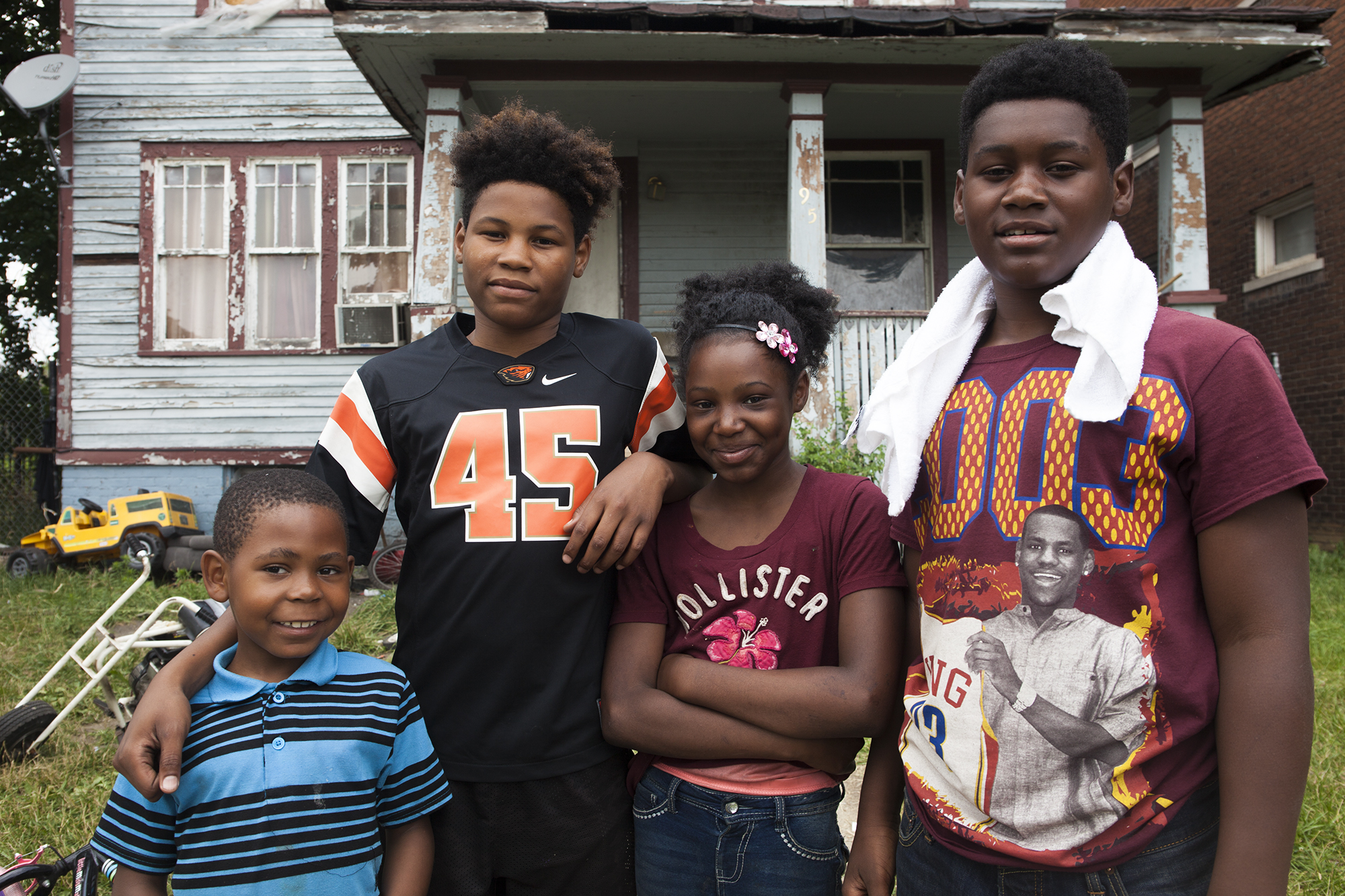 Lashanda Mayberry's children attended a Highland Park, Michigan, charter school, one of the few schools left in the suburb. Mayberry's children, pictured from right, are Tazeon, 15, Myaira, 11, and Keon, 13. Also pictured is Mayberry's nephew, Armani, 7. (Jeffrey Pierre/News21)