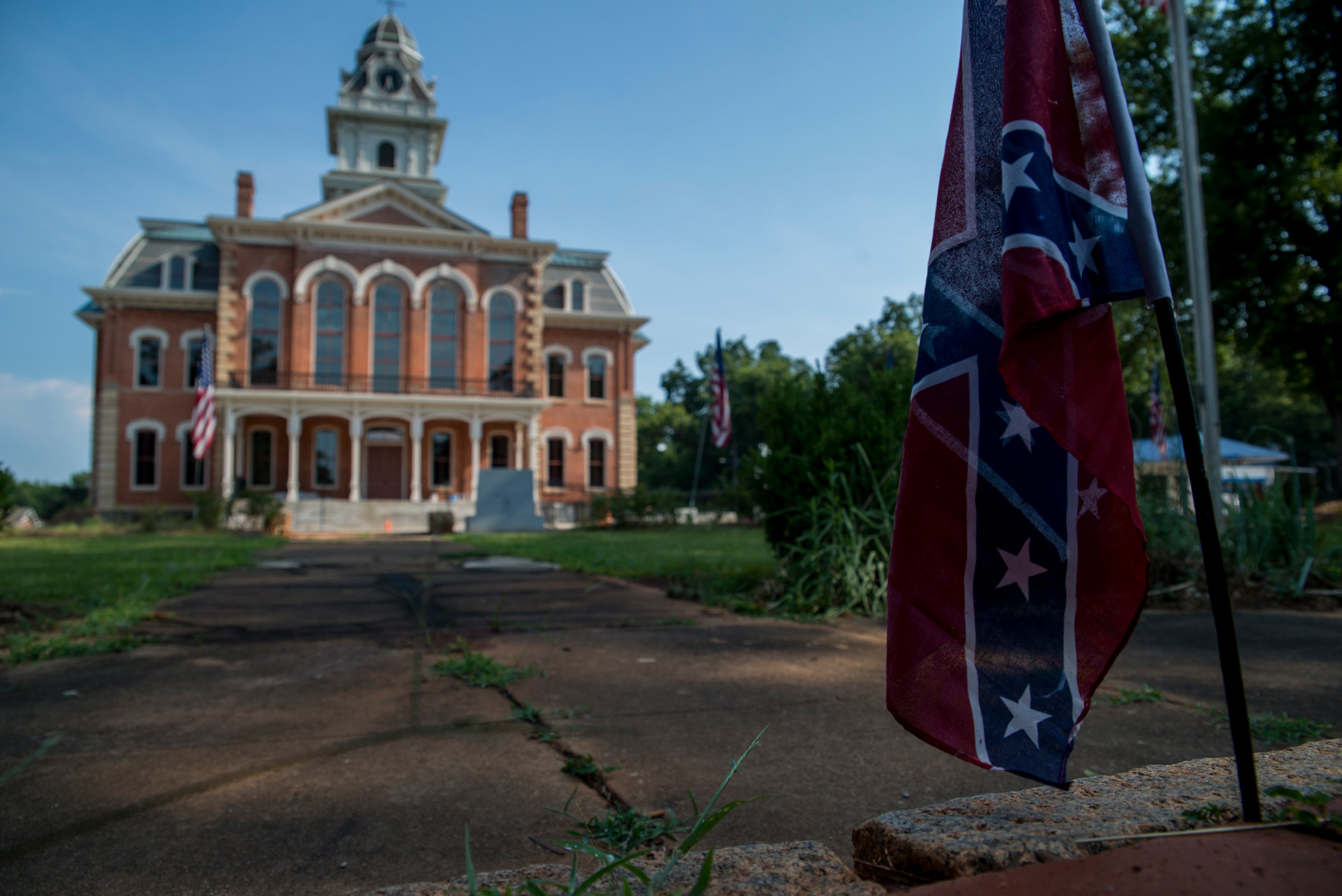 The Hancock County courthouse is in the county seat of Sparta, Georgia. Across from the courthouse a Confederate flag is wedged into the bricks of the Civil War memorial dedicated to those who served in the Confederacy. Sparta’s population is nearly 80 percent black. (Roman Knertser/News21)