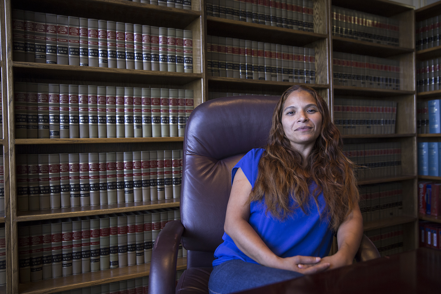 Rosa Maria Ortega sits inside her Dallas attorney’s office. Ortega, a U.S. resident but not a citizen, was arrested on illegal voting charges after an investigation by the state’s attorney general and the Tarrant County district attorney’s office. According to her lawyer Domingo Garcia, Ortega discovered she wasn’t eligible to vote after she updated her voter registration to Tarrant County, despite having voted three times in Dallas County. (Pinar Istek/News21)