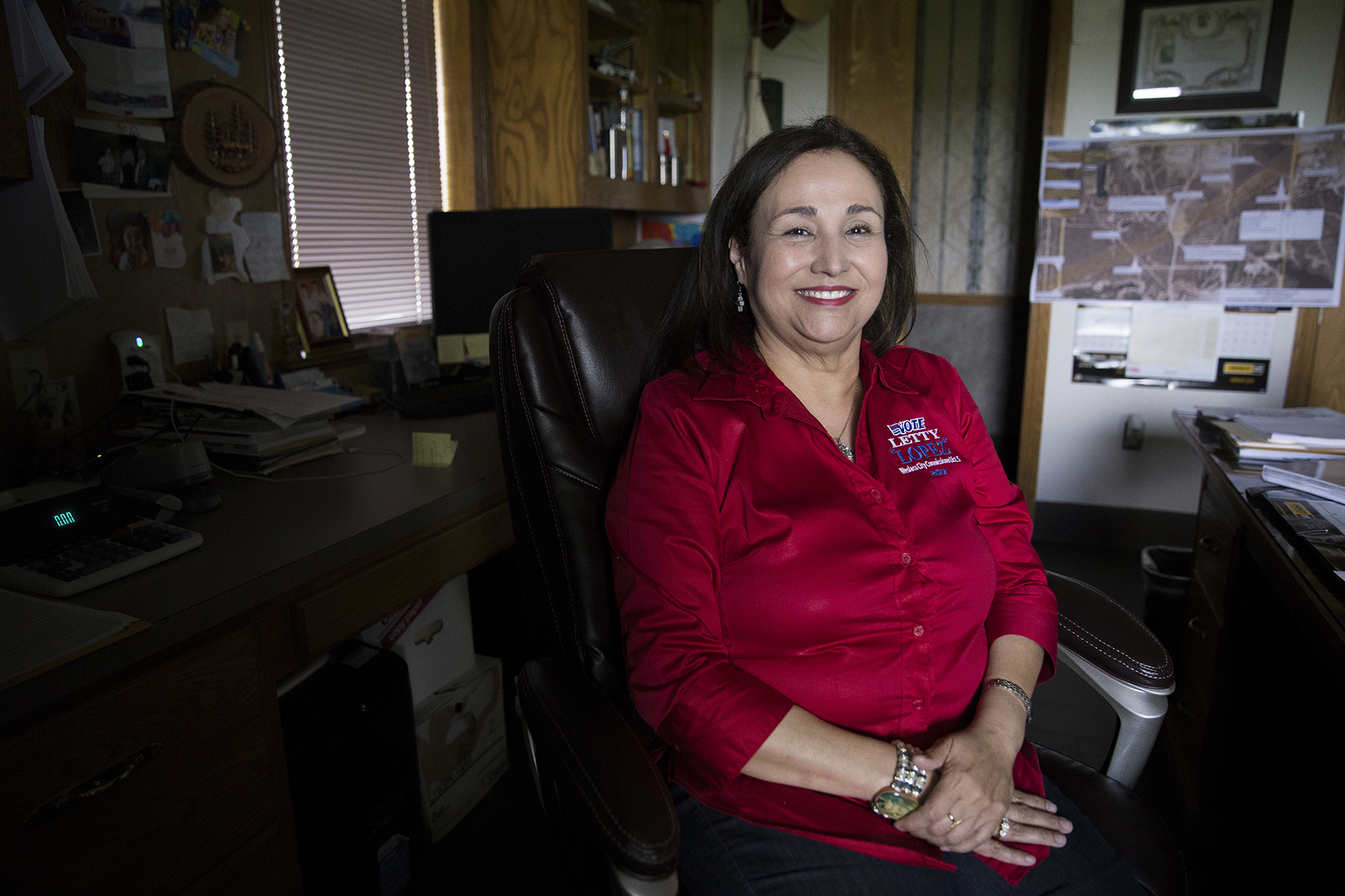 Letty Lopez, a city commissioner in Weslaco, Texas, poses for a portrait in her office. Although she originally ran for commissioner in November 2013, it wasn’t until a special election two years later that she could take the position. Lopez contested the 2013 election after falling short by 16 votes. She discovered elderly citizens had not filled out their mail-in ballots on their own. (Pinar Istek/News21)