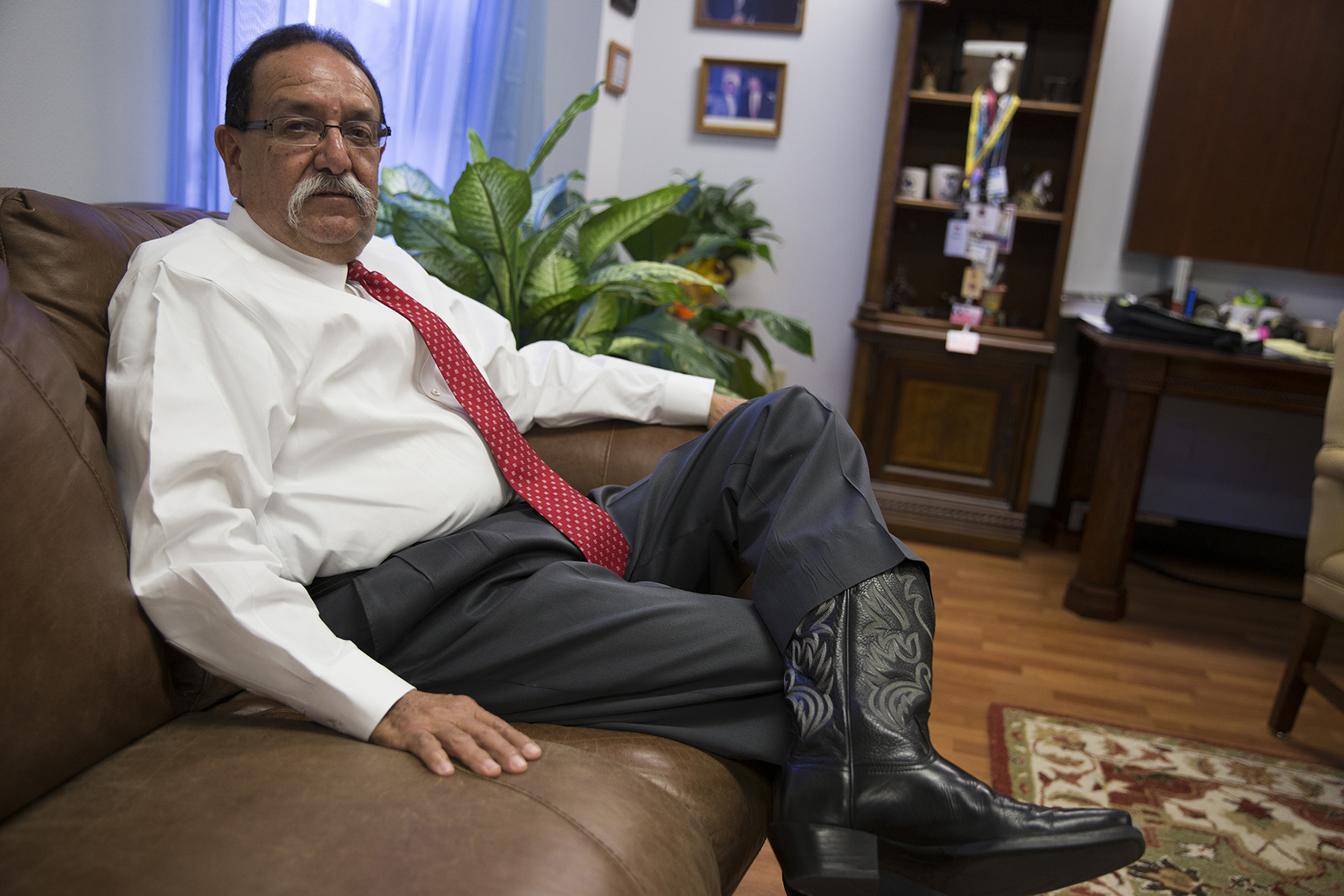 Luis Saenz, the district attorney in Cameron County, Texas, discusses voter fraud in his office in Brownsville. Saenz’s office assisted the state’s attorney general with prosecuting six women who were arrested for mail-in ballot fraud during the 2012 Democratic primary runoff. Mail-in ballot harvesters — or “politiqueras” — are not as prevalent in the Rio Grande Valley after the 2012 arrests, Saenz said. (Pinar Istek/News21)