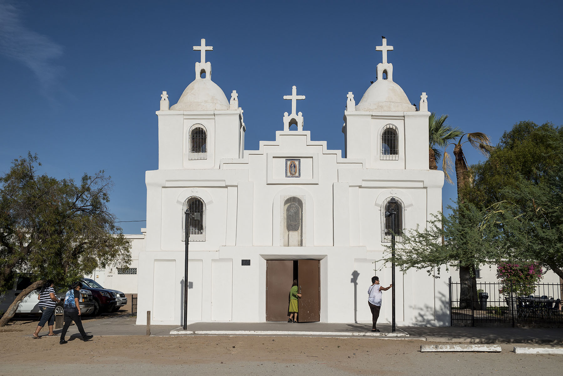 Guadalupe, Arizona, has a majority Latino population, and its Our Lady of Guadalupe Church draws Latinos from nearby towns who say it reminds them of churches in Mexico. (Roman Knertser/News21)