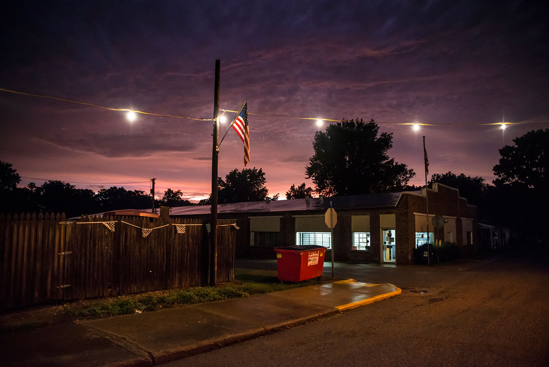 A brilliant sunset fades after a thunderstorm in Newport, Indiana. Residents said they did not have trouble voting because the small-town atmosphere means poll workers know all the townspeople, making it easier to prove their identity at the polls. Indiana was the first state to pass a strict photo ID law. (Roman Knertser/News21)