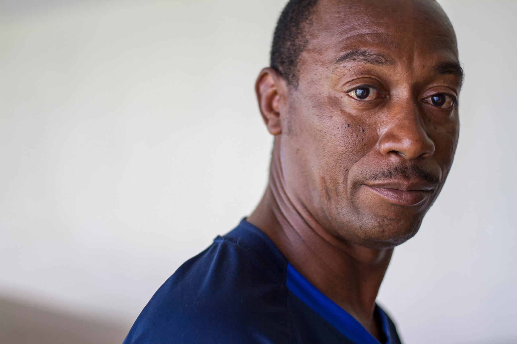 Calvin Johnson, who recently had his voting rights restored, pauses in the hallway of a church in Norfolk, Virginia. (Photo and audio by Marianna Hauglie/News21)